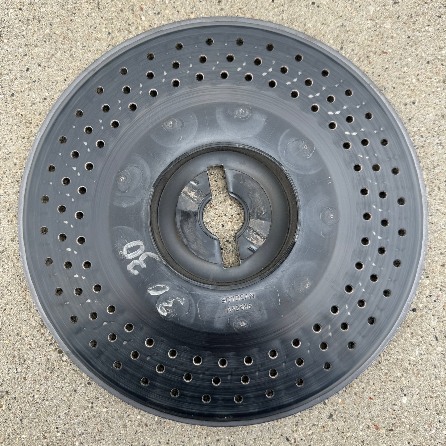 Front view of John Deere A42586 Soybean Seed Plate – 108-cell disk