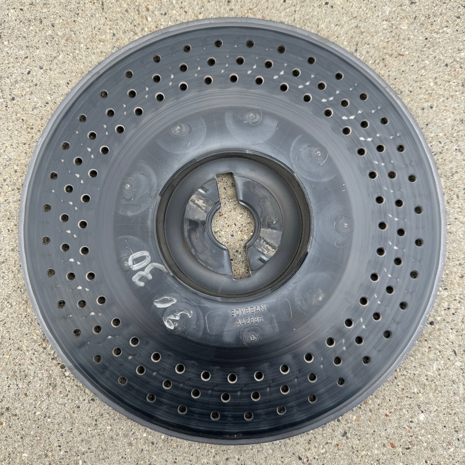 Front view of John Deere A42586 Soybean Seed Plate – 108-cell disk
